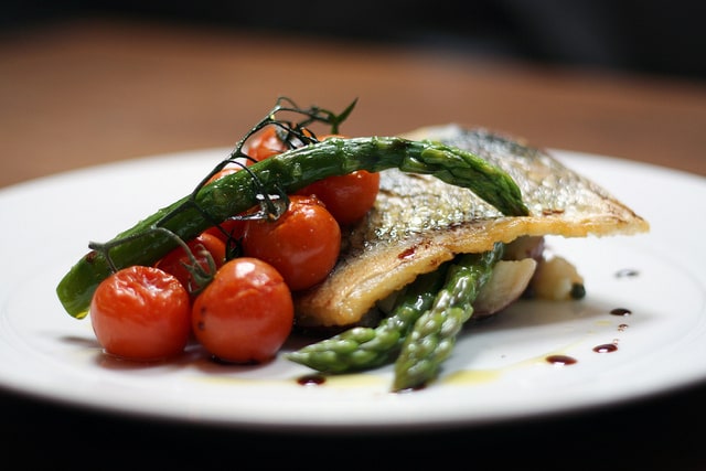 Pan-Fried Sea Bass with Asparagus and Baby Plum Tomatoes